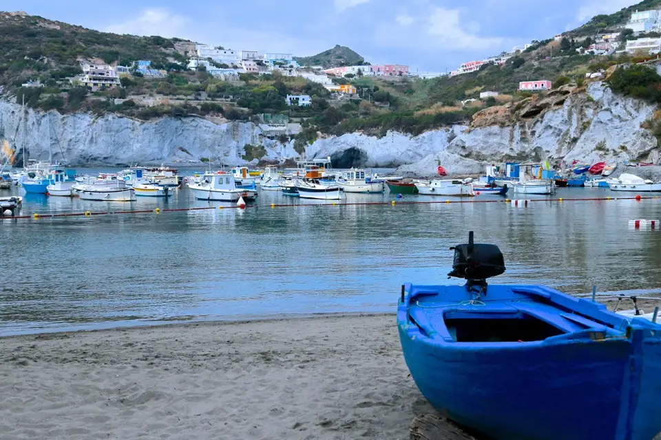 Fishing boats in Ponza harbour beneath the island town